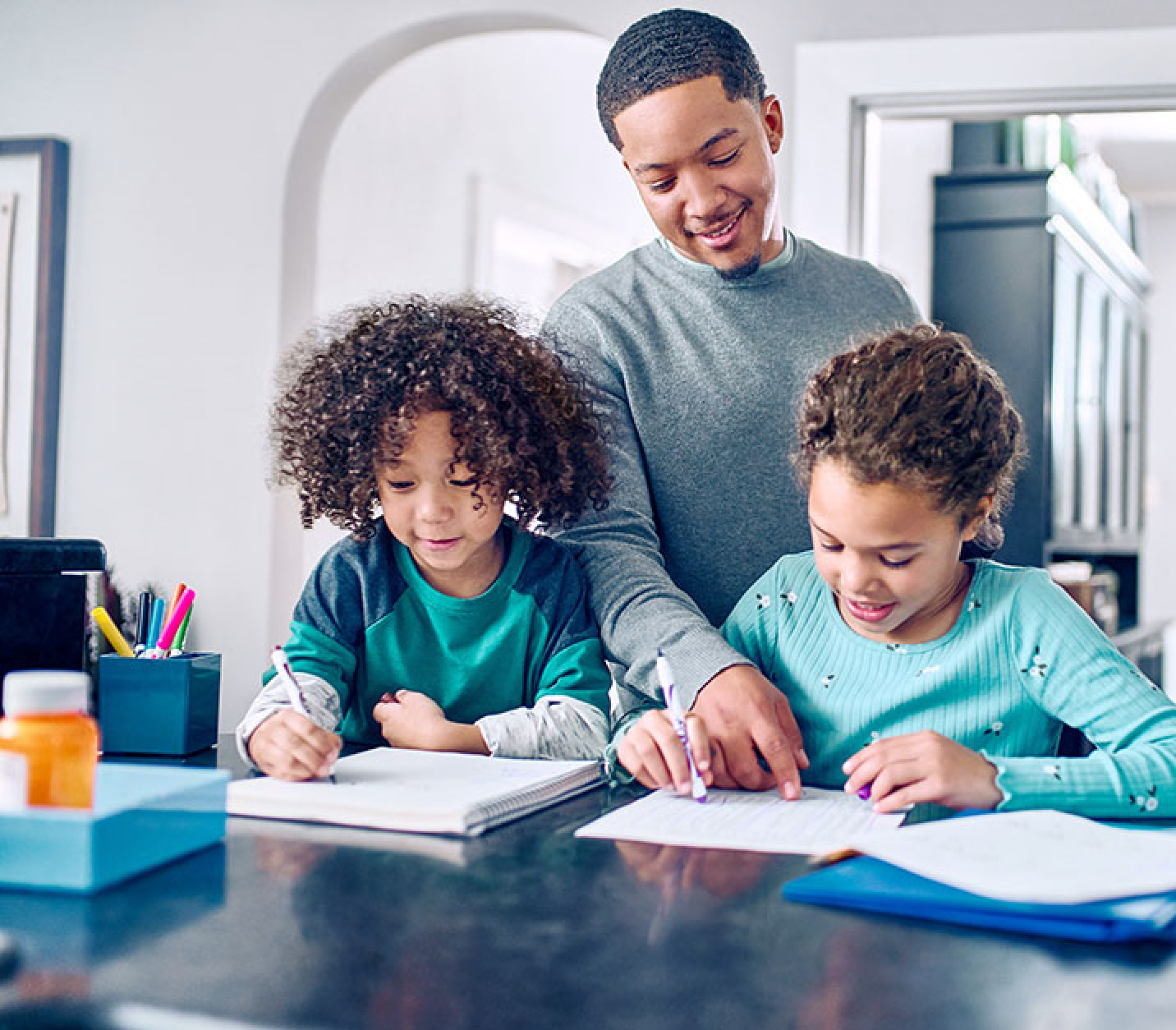 Family working on homework together